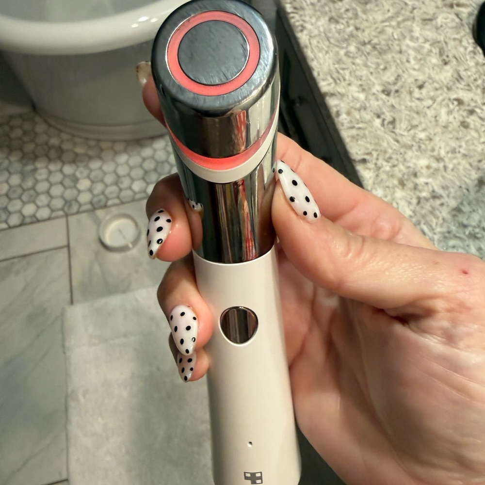 Silver and White Medicube Air Shot Skincare Device